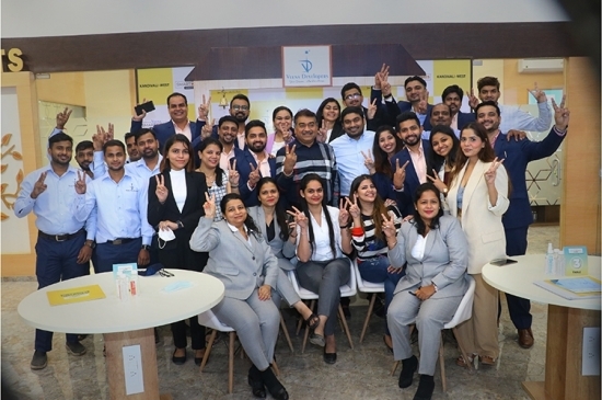 Team of Veena Developers celebrating their success